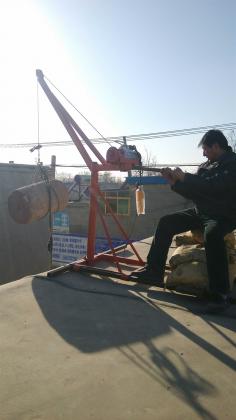 200公斤便攜式電動升降機樓房吊裝